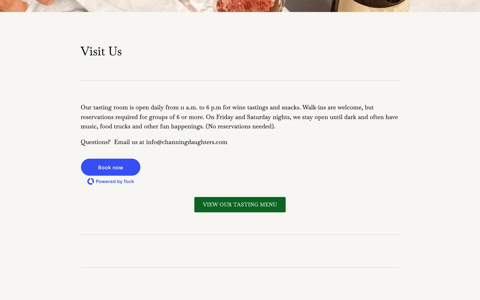 The Visit page showing a working blue Book Now button powered by Tock.